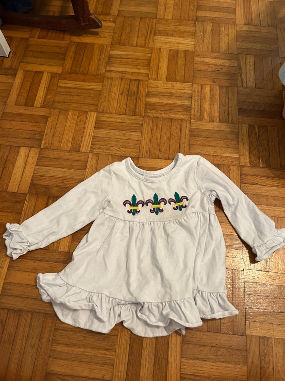 Girls' White Ruffle Long-Sleeve Top with Fleur-de-Lis Embroidery